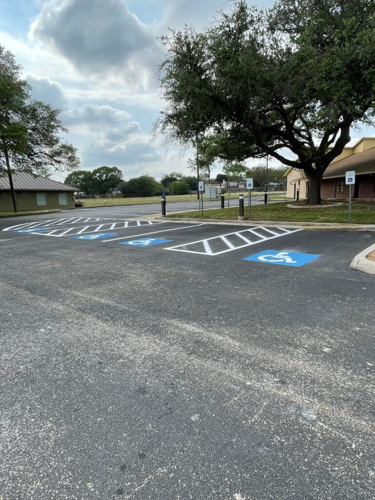 Handicap stenciling for parking lots.